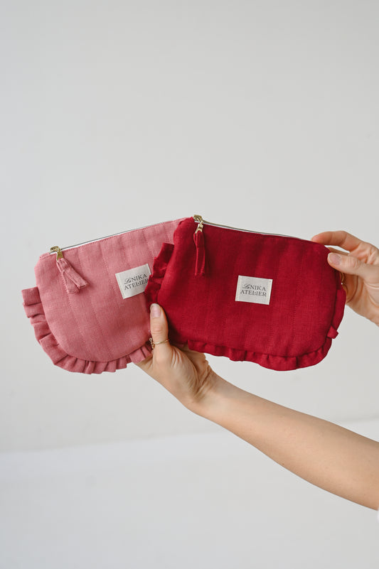 Lanena toaletna torbica z volančki